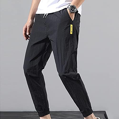 Calças masculinas da moda e calças soltas com calças de faixa amarrada calça masculina meia meia
