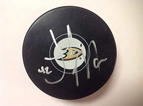 Josh Manson assinou autografado Anaheim Ducks Hockey Puck A - Pucks NHL autografados