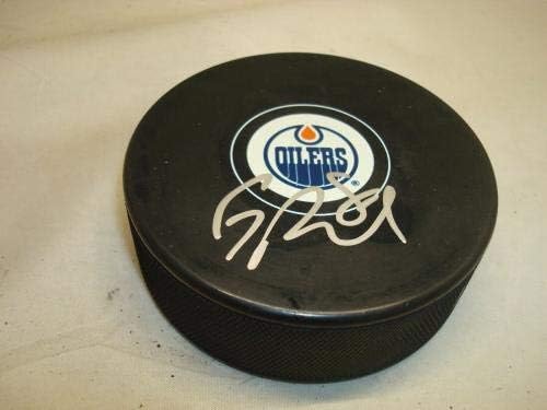 Griffin Reinhart assinou o Edmonton Oilers Hockey Puck autografado 1A - Pucks autografados da NHL