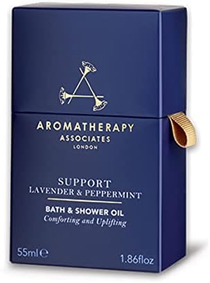 Os associados de aromaterapia apóiam o banheiro e o peppermint e o óleo de banho. Óleo de banho luxuoso para confortar e acalmar.