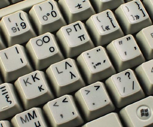 Adesivos de teclado grego com letras pretas em fundo transparente