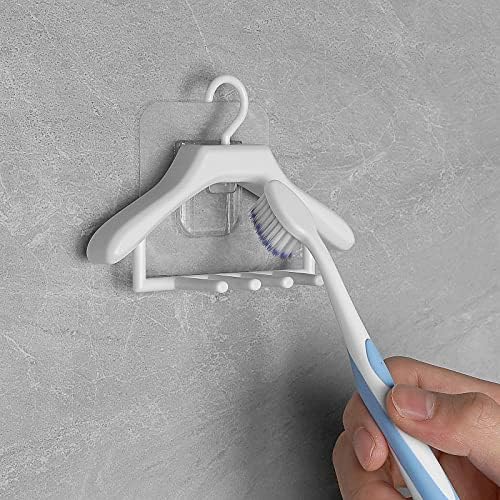Dodamour Mini Hanger Soldador de dentes de dentes, suporte de armazenamento de escova de dentes sem pancadas, plástico de escova de dentes de pasta de parede de parede de dupla face plástica para banheiro