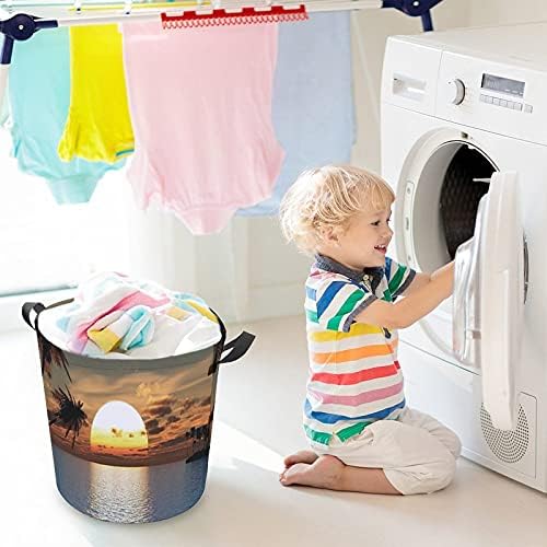 Foduoduo Cesta de lavanderia Sunset Pós -brilho Sunset Glow Palm Tree Tree Horty With Handles Turmper Turmper Dirty Roupas Saco de armazenamento para quarto, banheiro, livro de roupas de brinquedo