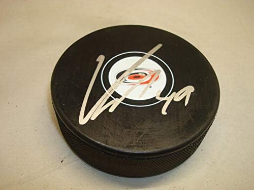 Victor Rask assinou o Hockey Puck do Carolina Hurricanes autografado 1a - Pucks autografados da NHL